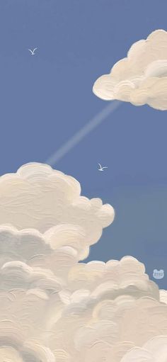 an airplane is flying in the sky with clouds