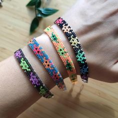 These pixel art alien bracelets are sure to add some colour and fun to your days 👾 These beautiful and super colorful bracelets feature high quality Miyuki glass beads and silver/Gold plated metal finishings. 🌈 Each bracelet is one of a kind, handbeaded by me. The length of each bracelet is approximatively 17cm, but I can make them longer by adding more metal rings at the end upon request. Send me a message for any questions! 😊 Alien Bracelets, Multicolor Tiny Beads Braided Bracelet As Gift, Multicolor Braided Bracelets With Tiny Beads As Gift, Multicolor Braided Bracelet With Tiny Beads For Gifts, Multicolor Tiny Beads Braided Bracelets For Friendship, Multicolor Braided Bracelets With Tiny Beads For Friendship, Multicolor Jubilee Friendship Bracelets, Rainbow Tiny Beads Friendship Bracelets, Rainbow Beaded Bracelets For Gifts, Rave Style