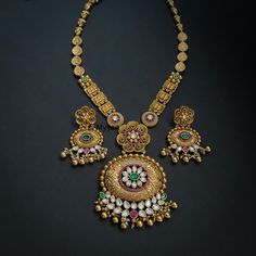 Premium quality Matt gold long rajwadi necklace set with kundan details and beautiful drop earring. Inspire your style with this beautiful gold haram necklace.  All orders Ship same day if placed before 4:00 PM EST  Earring Length: 2.5 inch Earring Width: 0.75 inch Necklace length: 24 inch Pendant width: 2.6 inch Create beautiful memory for any occasion with elegant jewelry for your loved ones You will receive carefully packaged items in jewelry box, ready to give memorable gift  to your Wife, m Antique Gold Kundan Necklace For Wedding, Antique Gold Temple Necklace With Meenakari, Antique Gold Meenakari Temple Necklace, Antique Kundan Necklace For Wedding With Tilla, Antique Kundan Necklace For Wedding And Festive Occasions, Yellow Gold Kundan Temple Necklace With Latkans, Antique Kundan Bridal Necklace For Wedding, Antique Kundan Jewelry Sets For Wedding, Antique Kundan Chandbali Necklace For Wedding