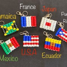 four keychains made out of beads with different colors and designs on each one