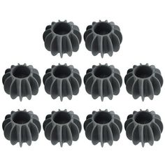 six black plastic bundt cake pans with holes on each side and one in the middle