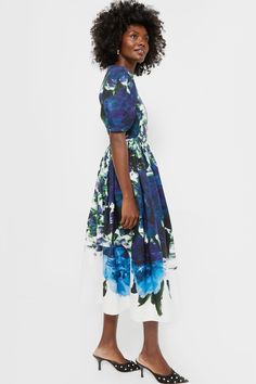 Based in London, ERDEM is an independent women’s fashion house founded by designer Erdem Moralioglu MBE. A storyteller at heart, Erdem creates expressive, powerful, timeless, and romantic designs. Each collection champions women and emphasizes not only what they wear, but, more importantly, how they feel.The Blue Short Sleeve A-line Midi Dress will make you feel like the bell of the ball at your next formal event. Featuring a beautiful floral print, A-line silhouette, and midi length, this piece Chic Blue Dress With Voluminous Skirt, Blue Evening Dress With Voluminous Skirt, A Line Midi Dress, Erdem Moralioglu, Ralph Lauren Shop, Cocktail Attire, Romantic Design, Black Heel, Independent Women