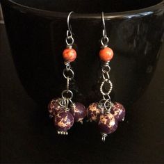 These Handcrafted One Of A Kind Earrings Are Made With Purple Impression Jasper Rounds And Orange Howlite Rounds On Fish Hook Ear Wires. Ear Wires Are Nickel Free. Earrings Measure 2”. Designed And Handcrafted By Me Boho Bohemian Gypsy Witchy Hippie Hippy Festival Summer Gemstone Spring Vacation Jewelry Earrings Artisan Unique Purple Earrings With Dangling Beads, Adjustable Purple Earrings, Purple Dangle Earrings With Ear Wire, Purple Wire Wrapped Beaded Earrings For Gift, Purple Dangle Beaded Earrings Wire Wrapped, Adjustable Wire Wrapped Purple Beaded Earrings, Purple Wire Wrapped Drop Beaded Earrings, Purple Wire Wrapped Beaded Dangle Earrings, Purple Wire Wrapped Dangle Beaded Earrings