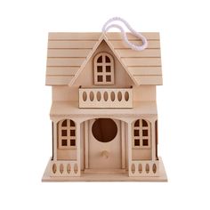 a wooden birdhouse with a white cord hanging from it's roof and windows