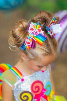 Rainbow print adds a fun pop to any look Thick ribbon for sweet girly accent Alligator clip gives a secure fit Bow works for simple or dressy outfits Measures approximately 6 inches Add cute detail to her everyday hairstyles with this Candyland Bow. This colorful bow with candy details makes it a versatile piece in her hair accessories, and is easy to match with any outfit. The girly bow comes attached to an alligator clip that makes it easy to clip into any hairstyle for easy styling. She can w Candyland Princess, Candy Hairstyles, Candyland Costume, Bow Hairstyles, Homecoming 2024, Candy Costumes, Sparkle In Pink, Candy Hair, Candyland Party