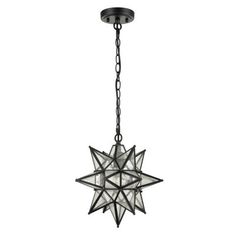 a black chandelier hanging from the ceiling with an intricate star design on it