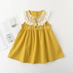 Toddler Girl Lace Collar Dress - PrettyKid Cute Doll Collar Dresses For Summer, Cute Doll Collar Summer Dresses, Cute Summer Dresses With Doll Collar, Summer Sleeveless Dress For Dress-up, Casual Sleeveless Summer Dress For Dress-up, Summer Cotton Sleeveless Dress For Playdate, Cotton Sleeveless Dress For Summer Playdate, Cute Sleeveless Dress For Summer, Summer Sleeveless Dress With Ruffles For Dress-up