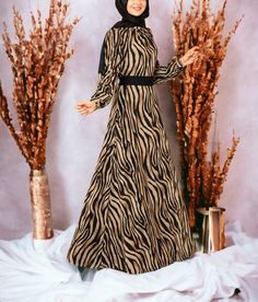 Zebra Pattern Tulle Dress; It is produced using 1st quality printed tulle. It is lined. It is light and flexible. The length of the dress is 150 cm. The mannequin size is 36, the length of the mannequin is 1.75. Fitted Thobe For Eid Party, Festive Long Dress Abaya For Party, Festive Party Abaya Long Dress, Festive Party Long Abaya, Long Sleeve Thobe For Eid Evening, Modest Maxi Dress For Festive Occasions, Festive Long Sleeve Maxi Dress, Festive Evening Thobe With Long Sleeves, Fitted Maxi Length Thobe For Party