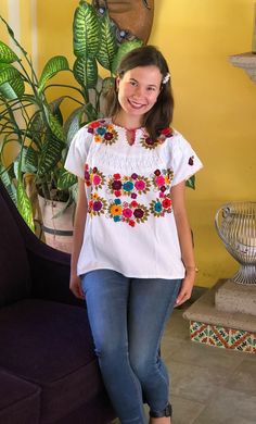 Mexican blouse, blouse with clips and fine embroidery, handmade blouse, blouse with multicolored floral embroidery, ethnic blouse, blouse of blanket. The embroidery of each blouse is unique so it may vary. This blouse is one size and fits S/M Mexican textile art has centuries of history and creativity throughout the country. Mexico is recognized as one of the leading countries with a beautiful aristic production in the textile world, miraculous hands of talented artisans from different states of White Embroidered Hippie Tops, Casual Multicolor Blouse With Intricate Embroidery, Casual Multicolor Embroidered Blouse, Folk Style Embroidered Top For Fiesta With Floral Embroidery, Folk Style Embroidered Top With Floral Embroidery For Fiesta, Folk Style Floral Embroidered Top For Fiesta, Traditional Blouse With Floral Embroidery For Fiesta, Floral Embroidered Top For Fiesta In Spring, Folk Multicolor Embroidered Tops For Cinco De Mayo