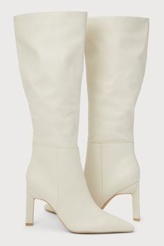 Creating the perfect autumn wardrobe starts with the perfect pair of boots, like the Lulus Olivet Cream Pointed-Toe Knee-High Boots! Smooth faux leather shapes these flirty fall boots that feature a classic pointed-toe upper, seaming at the vamp, and a 14.5"" knee-high shaft (with a 15"" circumference and a 9"" zipper at the instep). A sculpted, stiletto heel lends a eye-catching finish! 4" sculpted stiletto heel. Lightly cushioned insole. Rubber sole has nonskid markings. All Man Made Materials Chic Fitted Boots With Round Toe, Chic High Ankle Platform Boots, Chic Winter Boots With Padded Heel, Chic Pointed Toe Wide Calf Mid-calf Boots, Chic Boots With Reinforced Heel And Medium Width, Chic Fitted Knee-high Boots With Stacked Heel, Chic Boots With Padded Heel In Faux Leather, Chic Boots With Reinforced Heel, Chic High Heel Faux Leather Boots