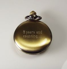 "Personalized pocket watches make great gifts for a birthday, Christmas, graduation, your best man or groomsmen, father of the bride or groom, Father's day, a retirement, or any special occasion! This beautiful watch has a lovely bronze finish, and with the jeweled mechanical movement it truly looks vintage! The front cover has a center cut out with factory embossed roman numerals, and is framed with fancy scrolls. The back cover is smooth and ready to be engraved with a monogram, name, initials Classic Engraved Pocket Watch For Anniversary, Gold Engraved Watch Accessories For Gift, Gold Engraved Watch Accessories Gift, Gold Engraved Watch Accessories As Gift, Personalized Gold Pocket Watch As A Gift, Personalized Gold Pocket Watch As Gift, Engraved Round Pocket Watch For Anniversary, Personalized Gold Pocket Watch For Gift, Antique Pocket Watch As Gift