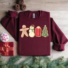 Gingerbread Cookies Sweatshirt, Christmas Shirt, Christmas Matching Sweatshirt, Family Shirt, Christmas Sweater, Xmas Shirt, Christmas Gift 📢 H O W  T O   O R D E R?📢  Please, check and review all photos Select Shirt Size and Color from Drop Down menu After choosing the color and size, you can write whatever you want in the personalization field. (If it's a customizable ad) and then add this tshirt to cart. Just do this for other t-shirts. You must collect all tshirts in the same basket and complete the payment. If you are in a hurry, you can purchase a Shipping upgrade on the checkout page. 🚀 Shipping We try to ship same day if we can't latest will be the next day. 🎨 How to Fit Tshirts are Unisex and are "TRUE TO SIZE" according to general customer experience. (as well as in my own ex Festive Winter Crew Neck Shirt, Crew Neck Shirt For Winter Festive Occasion, Christmas Crew Neck Shirt Gift, Christmas Gift Crew Neck Shirt, Long Sleeve Shirt For Christmas Gift, Christmas Matching, Womens Sweatshirts, Matching Sweatshirts, Xmas Shirts