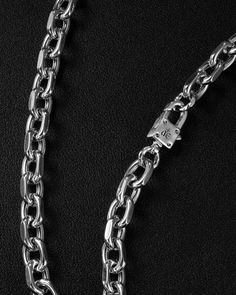 Cast and tethered by a forge, bearing links to charm all. Wear this sleek, versatile cable chain necklace on its own or imbue it with your essence by adorning it with your favourite charms from The Charm Lab series. Each link in the Catalyst Chain Necklace is meticulously carved with chiselled edges, embodying a versatile, genderless appeal.
Complete your look with other jewelry from the Catalyst series.
Sold individually. Each piece is lovingly crafted by hand, under ethical working conditions. Luxury Link Chain Necklace With Lobster Clasp, Timeless Link Chain Necklace With Lobster Clasp, Silver Cable Chain Necklace For Everyday Luxury, Everyday Rolo Chain Link Necklace, Luxury Sterling Silver Chain Necklace With Lobster Clasp, Silver Rolo Chain Necklace For Everyday, Luxury Silver Cable Chain Necklace For Everyday, Everyday Silver Rolo Chain Necklace, Luxury Sterling Silver Jewelry With Rolo Chain