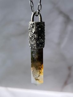 MOSS AGATE 'EROSION' AMULET NECKLACE. ONE OF A KIND. COLOR: MOSS AGATE + TEXTURED, OXIDIZED S.SILVER  PENDANT [WxH]: 0.54"x2.48"included bail [13.8mm x 47.6mm] VISIBLE CRYSTAL: 1.36" [34.6 mm] 2.7 Oval Cable Chain. [SOLD WITH OR WITHOUT CHAIN] Closure: Lobster claw. WEIGHT: 16.37 grams. [w/o chain] PURITY: .925 HANDMADE. BEFORE ORDERING, PLEASE READ THE DESCRIPTION CAREFULLY, ANY ADDITIONAL INFO CAN BE OBTAINED BY ETSY MESSAGE OR DM ME ON INSTAGRAM @furia_metalsmith. Silver Electroformed Agate Necklace, Unique Moss Agate Jewelry For Healing, One Of A Kind Moss Agate Pendant, Unique Engraved Agate Jewelry, Silver Crystal Necklace, Crystal Texture, Peridot Crystal, Amulet Necklace, Tourmaline Pendant