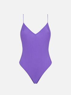 Woman one piece swimsuitShiny purple solid colorThin strapsRegular fitV neckComposition: 90% Polyamide, 10% elastaneCare instructions: Cold hand wash. Do not soak. Do not iron. Do not dry off in contact with other garments. Rinse after contact with chlorine or salt water Purple V-neck Swimwear With Lined Body, Sleek Solid Color Summer Leotard, Sleek Solid Leotard For Summer, Purple Lined Bodysuit For Pool, Purple Stretch Swimwear For Party, Stretch Purple Swimwear For Party, Party Seamless Elastane Swimwear, Purple One-piece Party Swimwear, Purple Sleeveless Swimwear With Adjustable Straps