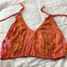 Never Worn Orange V-neck Top For Festivals, Orange Cropped Top For Beach, Red Summer Cami Top, Printed Tank Top For Beach, Orange Printed Sleeveless Top, Multicolor Cami Top For Vacation, Summer Printed Orange Tops, Multicolor Cami Tops For Beach, Pink Cropped Vacation Top