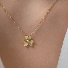 The necklace's floral design represents the blossoming of love and the growth of a strong and lasting relationship as you embark on your journey as a married couple. the clover is also seen as a symbol of fidelity and faithfulness. By wearing the Clover Flower Necklace, you may be expressing your commitment to remain loyal and devoted to your partner throughout your marriage. MATERIALS * 925 sterling silver * 18K Gold plated over 925 sterling silver * Adjustable (the adjustable length is about 1 Delicate Chain Necklace With Flower Pendant For Her, Delicate Chain Necklace With Flower Shape For Her, Elegant Birth Flower Pendant Necklace, Delicate Flower Charm Necklace For Her, Delicate Necklace With Flower Charm, Wedding Necklace With Adjustable Chain And Flower Pendant, Delicate Flower Charm Necklace Gift For Her, Elegant Birth Flower Pendant Necklaces, Delicate Flower Pendant Necklace For Her