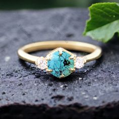 14k Turquoise Diamond Ring 5.0MM Three Gemstone Turquoise Engagement Ring December Birthstone Prong Set Jewelry Anniversary Gift For Love Main Stone -Turquoise (Lab Created) Stone Size - 5 mm Stone color - Blue Stone shape - Round Second Stone- CZ Diamond Stone color-Colorless Stone Shape-Round  Finishing- Excellent feel free to contact me if you have any questions Gemstone color may slightly vary from listed image due to the nature of all natural gemstone or different monitor settings TURNAROUND TIME Your order will be ready for shipment in 4-8 business days. Free economy shipping for US, UK, Germany- 10-15 business days delivery time. shipping upgrade available for US, UK, Germany- 5-7 business days delivery time. Please check shipping times for other countries by entering your country a Turquoise Accent Stones Promise Ring, Turquoise Accent Stones Jewelry For Promise Ring, Turquoise Gemstone Jewelry For Promise Ring, Turquoise Jewelry With Gemstone Accents For Promise Ring, Turquoise Ring With Accent Stones For Promise, Turquoise Three Stone Ring As A Gift, Gold Turquoise Promise Ring, Gold Turquoise Gemstone Promise Ring, Turquoise Three Stone Ring For Gift