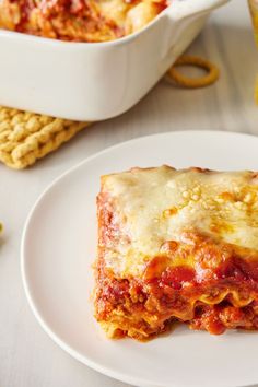 a slice of lasagna on a white plate