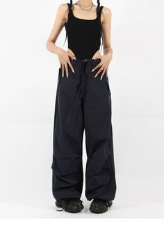 There’s a new trend in town, and it’s nightcity clothing’s Button Pocket Oversized Parachute Pants. These comfy, lightweight pants look great when paired with a crop top or graphic tee and sneakers. With a drawstring waistline, these pants are comfortable and secure, and the oversized fit gives them an effortless and chill look. Add these pants to your wardrobe, and you’ll never have a dull moment — you’ll always be ready for an impromptu night out, no matter how casual it might be.
Gender: Wome Versatile High Waist Parachute Pants With Relaxed Fit, Urban Style Stretch Wide Leg Bottoms, Urban Stretch Wide Leg Bottoms, Stretch Wide-leg Parachute Pants For Streetwear, Trendy Relaxed Fit Wide-leg Parachute Pants, Baggy Wide-leg Parachute Pants, Trendy Wide-leg Parachute Pants With Relaxed Fit, Versatile Baggy Wide-leg Parachute Pants, Urban Baggy High-waisted Pants