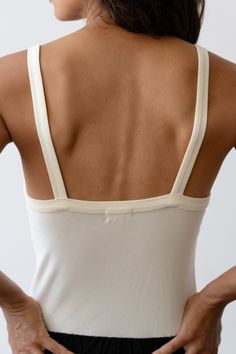 The Baby Rib Square Neck Tank is crafted from our butter-soft Baby Rib fabric. Featuring, a slim-fit, square neck, and full length fit. Made in Los Angeles Fitted Sleeveless Bodysuit For Everyday, Fitted Cream Tank Top With Built-in Bra, Everyday Fitted Sleeveless Bodysuit, Fitted Tops With Tank Straps For Daywear, Classic Cotton Fitted Bodysuit, Fitted Tank Strap Tops For Daywear, Everyday Solid Fitted Bodysuit, Fitted Square Neck Seamless Tank Top, Fitted Cotton Bodysuit For Loungewear