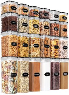 a large assortment of nuts and cereals in glass containers with labels on the side