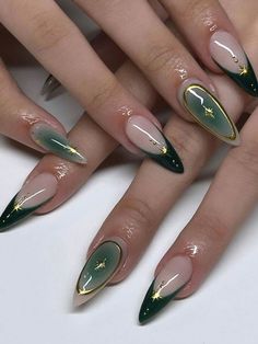 #StripedNails #NailArt #NailDesign #StripesOnNails #BoldNails #ChicNailArt #CreativeNails #NailInspo #FashionNails #StripedManicure Dark Green Nails Gold Accent, Wedding Nails Celestial, Green Gold Nail Art, Fall Foliage Nails, Camp Flog Gnaw Nails, Nails Dark Green And Gold, Dark Purple Sparkle Nails, Peter Rabbit Nails, Olive Almond Nails