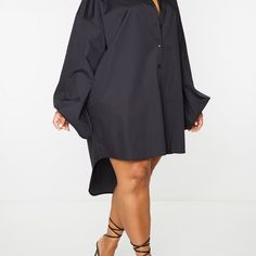 Make A Serious Style Statement In This Shirt Dress. Featuring A Black Material With A Balloon Sleeve Design And Button-Up Detail. Wear This With Heels And Hoop Earrings For A Simple But Chic Combo. Fabric And Care 55% Cotton 45% Polyester Never Warn/ New With Tags Smoke And Pet Free Home Oversized Long Sleeve Mini Dress For Daywear, Solid Button-up Shirt Dress For Party, Solid Oversized Shirt Dress For Work, Oversized Shirt Dress For Work, Oversized Solid Shirt Dress For Work, Oversized Solid Color Shirt Dress For Work, Elegant Oversized Mini Dress, Oversized Long Sleeve Dress With Button Closure, Oversized Long Sleeve Shirt Dress For Brunch