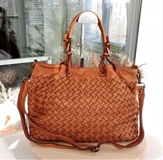 "Cognac Woven Leather Bag, Soft Woven Handbag, Leather Tote Woman, Handmade Shoulder Bag, Large Tote Bag, Modern Leather Crossbody Bag, Elow comes in two versions, LARGE: W 15\" x H 11.4\" x D 7.1\" & SMALL: W 13\" x H 10\" x D 6\". Handle drop: 4\" This bag has made by our italian partner and customizable by our team. We offer one free monogram or name personalization. Please check fonts, color thread, tag samples and leave your monogram or name to embroider. Features: Inside: The bag close Cognac Tote Shoulder Bag With Braided Handles, Cognac Bag With Braided Double Handles, Cognac Shoulder Bag With Braided Handles, Cognac Bag With Braided Handles For Everyday, Cognac Bags With Braided Handles For Daily Use, Daily Use Cognac Bag With Braided Handles, Cognac Tote Bag With Braided Handles, Cognac Shopping Bag With Braided Handles, Woven Leather Tote