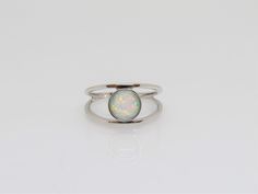 Vintage Sterling Silver White Opal Ring ...Marked 925...Total of weights 2.2grams...Size 7...Measure of stone center 10.2MM...It's in very good condition. A Nickel-free Opal Silver Ring, Silver Opal Ring With Round Stone, Silver Solitaire Midi Ring, Stackable Silver Opal Jewelry, Nickel Free Sterling Silver Opal Ring, Nickel-free Sterling Silver Ring With Round Stone, Nickel-free Sterling Silver Rings With Round Stone, Sterling Silver Opal Ring With Round Band, Sterling Silver Opal Ring With Round Stone