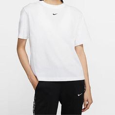 AS W NSW ESSNTL Top SS BF WHITE BLACK CT2588-100 Nike White Sports Top, Nike White Tops For Gym, White Nike Tops For Gym, White Sportswear Top For Gym, White Sportswear Tops For Sports, Casual White Activewear With Crew Neck, Casual White Crew Neck Activewear, Nike White Athleisure Top, White Nike Athleisure Top