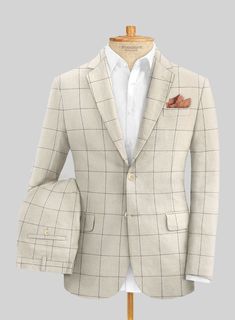 Make your remarkable trait sparkle with an attire that will hoist your presence at greater heights. Tailored with pure linen, our Solbiati Linen Leonea Suit is woven in a checks pattern that gives a unique update to your closet. The beige color will provide you with immense popularity and let you express yourself in the most charming ways. So, with extreme comfort for your day, go for this patterned suit that promises an on-trend style.  Look Includes    Solbiati Linen Leonea Fabric  Two Button Jacket Style  Notch Lapel  Corozo Ivory Buttons  Single Vent  Three Cuff Buttons  Two Welted Back Pockets on Trousers   Click 'Customize Now' to modify the look if needed.  Lining: Viscose, Dry Clean, Pants can be lightly washed. Patterned Suit, Checks Pattern, Master Tailor, Trend Style, Button Jacket, Jacket Buttons, Pure Linen, Check Pattern, Hat Sizes