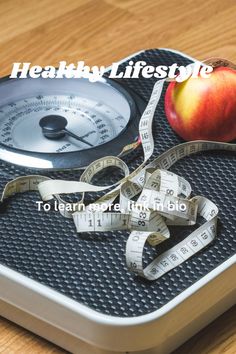 an apple and measuring tape sit on top of a scale with the words healthy life style