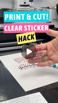 a person holding up a sticker that says print & cut clear sticker hack