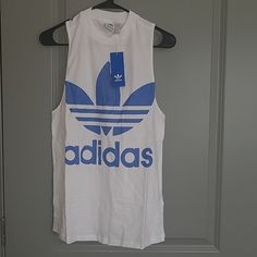 Adidas Originals Tee Condition: New Color: White/ Blue Size: S/ M One Per Order No Holds/ Trades Blue Tank Top For Spring Streetwear, Spring Blue Tank Top For Streetwear, Adidas Blue Sleeveless Top, Adidas Cotton Tank Top For Spring, Adidas Casual Summer Tank Top, Adidas Casual Sleeveless Top, Casual Adidas Summer Tank Top, Casual Adidas Sleeveless Top, Adidas Casual Cotton Tank Top