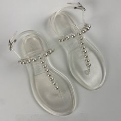 Brand: Stuart Wietzman Style: Goldie Jelly Slide Size: Women 5.0 Condition: New With Tags. No Box Or Packaging Included. No Wear Or Flaws. Color: Clear Elegant Ankle Strap Jelly Sandals, Elegant Open Toe Jelly Sandals, Elegant Summer Jelly Sandals With Round Toe, Elegant Flat Jelly Sandals For Spring, Elegant Ankle Strap Jelly Sandals For Summer, Elegant Summer Jelly Sandals With Ankle Strap, Elegant Flat Jelly Sandals For Vacation, Elegant Flat Jelly Sandals, Elegant Flat Jelly Sandals For Party