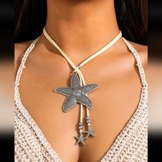 Bohemian Starfish Lariat Style Necklace Has A Cream Colored Faux Leather Cord With Starfish Beads Big Starfish Measures 2.5" Across Total Length Of Cord & Charm Is 24" Tags: Ocean Beach Summer Vacation Coastal Oceanic Boho Bohemian N#200 Metal Starfish Jewelry, Bohemian Jewelry With Starfish Charm For Festivals, Adjustable Star Charm Necklace For Summer, Beach-ready Adjustable Silver Jewelry, Festival Starfish Charm Jewelry, Bohemian Silver Necklace With Starfish Charm, Bohemian Silver Jewelry With Starfish Charm, Silver Starfish Charm Necklace For Summer, Silver Necklace With Starfish Charm For Summer