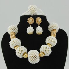 Make your wedding day truly memorable with our custom-made bridal jewelry set. Elegant White Bridal Set, Elegant White Jewelry Sets For Brides, Traditional White Jewelry For Marriage, Elegant White Necklace For Bride, Elegant White Jewelry For Bride, Elegant White Bride Necklaces, Elegant White Pearl Bridal Sets, Traditional White Jewelry For Anniversary, White Bridal Sets For Formal Occasions