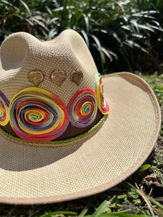 Hola and thank you for being part of our dream!  Here is very useful information before your purchase, but if you have any questions, do not hesitate to send us a message! Beautiful and colorful hats for women Handmade designed by Colombian artisan hands. It is exactly as shown in the pictures (It does include the decor on top) *SIZING* Size 3: 53-54cm Size 4: 55-56cm Size 5: 57-58cm Size 6: 59 +cm Please refer to the size measurement chart before ordering. You can find the measurement chart in the photos of our listing (all the way at the top). You will also find a guide that shows you how to take the correct measures. If you need additional photos or info to help you decide please message us! *GARMENT CARE* -Be sure to use only a damp cloth. A soaking wet cloth or sponge can cause water Whimsical Adjustable Straw Hat For Summer, Multicolor Curved Brim Sun Hat For Rodeo, Multicolor Flat Brim Fedora For Summer, Artisan Panama Hat With Curved Brim For Beach, Multicolor Summer Fedora For Vacation, Artisan Wide Brim Panama Hat For Beach, Whimsical Straw Hat For Summer Beach, Whimsical Straw Hat For Beach In Summer, Whimsical Summer Beach Hats