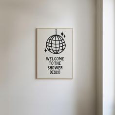 a sign that says welcome to the shower disco in black and white on a wall