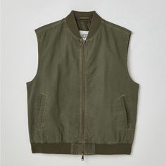 New With Tags Khaki Cotton Outerwear For Layering, Casual Relaxed Fit Vest For Fall, Spring Utility Cotton Vest, Casual Khaki Cotton Vest, Urban Cotton Vest For Fall, Casual Olive Outerwear With Relaxed Fit, Casual Olive Relaxed Fit Outerwear, Casual Green Work Vest, Casual Cotton Outerwear For Layering