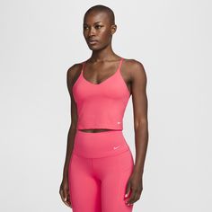 With smooth, quick-drying fabric that offers a clean finish, this bra tank makes the transition from your workout to the rest of your day easy. Light support gives you a gentle hold with plenty of freedom, while engineered removable pads and adjustable straps let you wear it your way. Functional Tank Activewear With Built-in Bra, Sportswear Tank Top With Built-in Bra For Training, Functional Sports Tank Top With Built-in Bra, Functional Workout Tank Top With Built-in Bra, Athletic Fit Tank Top With Built-in Bra, Sports Tank Top With Built-in Bra And 4-way Stretch, Moisture-wicking Activewear With Tank Straps, Go-dry Tank Activewear For Pilates, Nike Sports Bra With Built-in Bra For Training