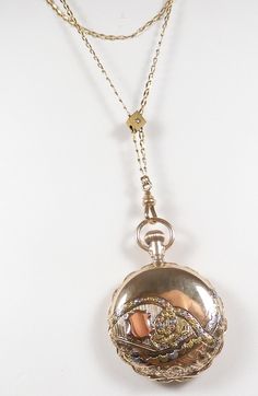 "Art Deco 14K Multi-Color Gold Hunting Case Women's Pocket Watch With Authentic Art Deco Rose Diamond Slide Chain {International Buyers Are Responsible For Customs & Duty Fees} Circa ~ September 1898 - June 1902 Manufacturer ~ America Waltham Watch Company Serial Number ~ 769520 Case Serial Number ~ 265656 0 Size Metal ~ 14K Yellow, White, Green And Rose Solid Gold Weight ~ 44.6 Grams Measurement Of Case (With Bow) ~ 50.40 MM - 1.9845 Inches Measurement Of Case (Without Bow) ~ 35.86 MM - 1.4115 Victorian Yellow Gold Pocket Watch For Anniversary, Elegant Yellow Gold Pocket Watch For Evening, Elegant Hallmarked Pocket Watch For Collectors, Heirloom Engraved Yellow Gold Pocket Watch, Elegant Yellow Gold Medallion Pocket Watch, Elegant Yellow Gold Circular Pocket Watch, Elegant Engraved Yellow Gold Pocket Watch, Elegant Gold Pocket Watch For Evening, Victorian Yellow Gold Pocket Watch For Collectors