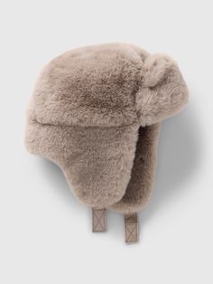 This trapper hat is made with a faux fur upper.  Ear flaps at sides.  Soft closure at chin.  Fully lined at crown.  For more fit and sizing info, check out our Size Guide. Fur Trapper Hat, Fur Trapper, Trapper Hat, Trapper Hats, Gap Kids, Toddler Gifts, Girls Accessories, Size Guide, Gifts For Kids