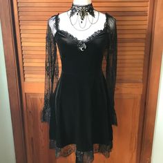 - Non-Wrinkle Black Velour Material - Long Lace Sleeves Gathered At The Bottom - A Bow And Sickle Moon On The Chest - Wide Lace Trim At The Bottom - Brand New, No Brand Size M Bust 34-36" Waist 26-28" Hips Free Sleeve Length 26" Shoulder To Hem 33" (Plus Lace) Genshin Clothes, Black Velvet Lace Dress, Catholic Fashion, Vampire Fashion, Velvet Lace Dress, Long Lace Sleeves, Goth Clothes, Moon Black, Photoshoot Makeup