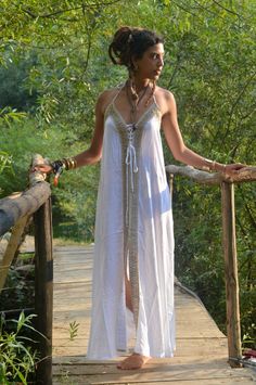 Boho maxi dressOur elegant, flowing Boho Infinity dress is in white withe gold aplique  back in stock finally A Gypsy dress with style and sophistication. Made from Rayon (a wood based fabric) with stunning intricate natural hemp applique. This is definitely a Hippie dress with style. It is for DRY CLEAN only .My love for Alternative clothing in a kind of Hippie clothes style is obvious here , fusing Bohemian with class. This Loose maxi dress is ideal for evening out and looking stunning at part Promenade Dress, Pagan Clothing, Dress Alternative, Pixie Dress, Maxi Dress Designs, Maxi Dress Summer, Hippie Dress, Hippie Clothes, Loose Maxi Dress