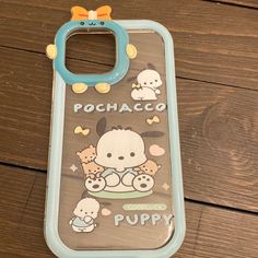 a cell phone case with an image of a dog and puppies printed on it