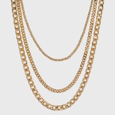 Get a layered jewelry look with ease with this 16-Inch Layered Curb Chain Necklace from A New Day™. Featuring three different thicknesses of chain in a shiny gold finish, this three-layer gold chain necklace makes it easy to create a coordinated look that instantly elevates a plain tee or a variety of other outfits. A lobster claw clasp closure makes for easy fastening at the back, and the shiny gold finish pairs perfectly with casual and dressy looks alike. A New Day™: Style that goes wherever Gold Layered Chain Link Necklace, Gold Layered Necklace With Chunky Chain Links, Gold Link Chain Layered Necklace, Y Necklace Gold, Double Layer Necklace, Layered Chain Necklace, Curb Chain Necklace, Y Necklace, Layer Necklace