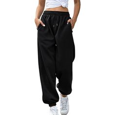 Women High Waisted Sweatpants Joggers Drawstring Athletic Pants With Pockets are the ideal fusion of fashion and coziness. These functional pants are made to move with you, giving you unrestricted freedom to run, jump, and stretch. They are suitable for the entire day because of the smooth, breathable fabric. These jogger pants are a stylish statement that can be dressed up or down thanks to their striking hues and modern style. Specifications: Fabric Type: Cotton, polyester Care Instructions: Baggy Harem Pants With Drawstring For Loungewear, Baggy Drawstring Harem Pants For Loungewear, Baggy Solid Color Activewear For Loungewear, Solid Drawstring Pants For Leisure, Leisure Solid Pants With Drawstring, Solid Color Baggy Activewear For Loungewear, Leisure Solid Color Pants With Drawstring, Sportswear Pants With Drawstring For Jogging, Comfortable Drawstring Pants