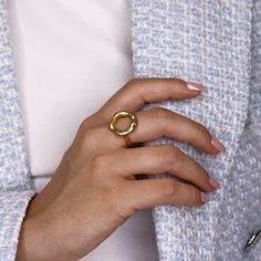 Embrace simplicity with our Organic Open Circle Ring. Crafted from ethically sourced materials, its minimalist design exudes elegance. Versatile for any occasion, this ring is a timeless addition to your jewelry collection. Handcrafted with love, it symbolizes endless possibilities. PRODUCT DETAILSMaterials: Pewter alloy base plated with 24-kt gold / sterling silver.Measurements:*Slightly adjustable to fit most*MSRP: $34 Open Circle Ring, Carved Ring, Circle Ring, 24kt Gold, Jewelry Business, Endless Possibilities, Minimalist Design, Love It, With Love